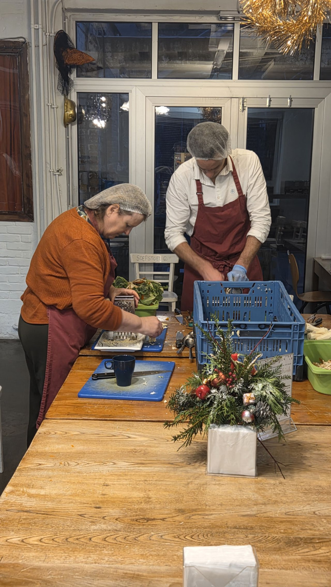 MindWave team members volunteering in a community kitchen